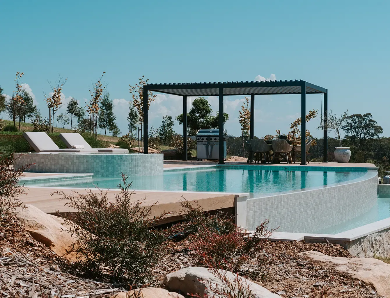 POOL FROM-THE-EARTH FRAGMENT GALLERY-IMAGES Fragment-mosiac-grey-pool-tiles-installed-on-backyard-pool-gallery-1